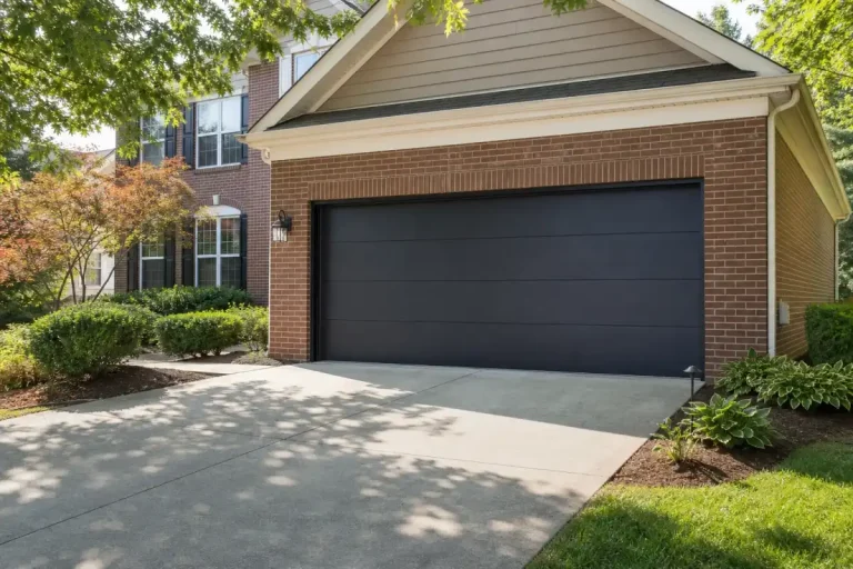 New steel garage door on a brick suburban home in the DC area